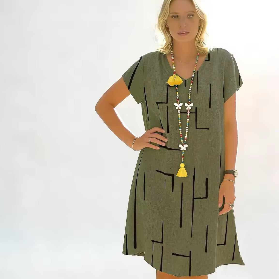 Vestido estampado de lino y algodón con cuello en V, color oro puro, 2026 - Oferta