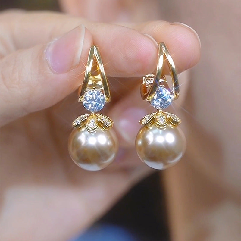 Pendientes de plata con perlas de lujo francés de nuevo estilo 2026
