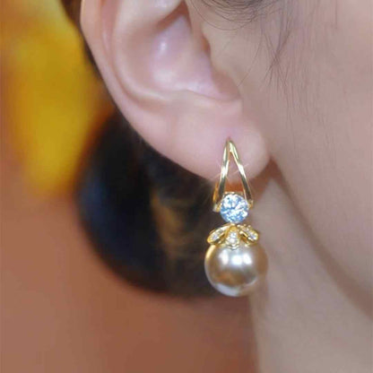 Pendientes de plata con perlas de lujo francés de nuevo estilo 2026