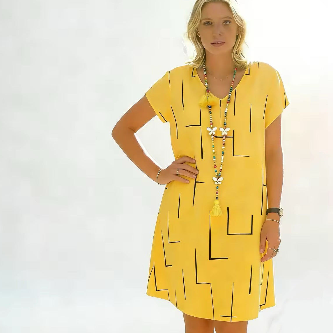 Vestido estampado de lino y algodón con cuello en V, color oro puro, 2026 - Oferta