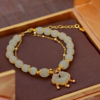 Nueva pulsera de jade hetiano en oro de 14 quilates